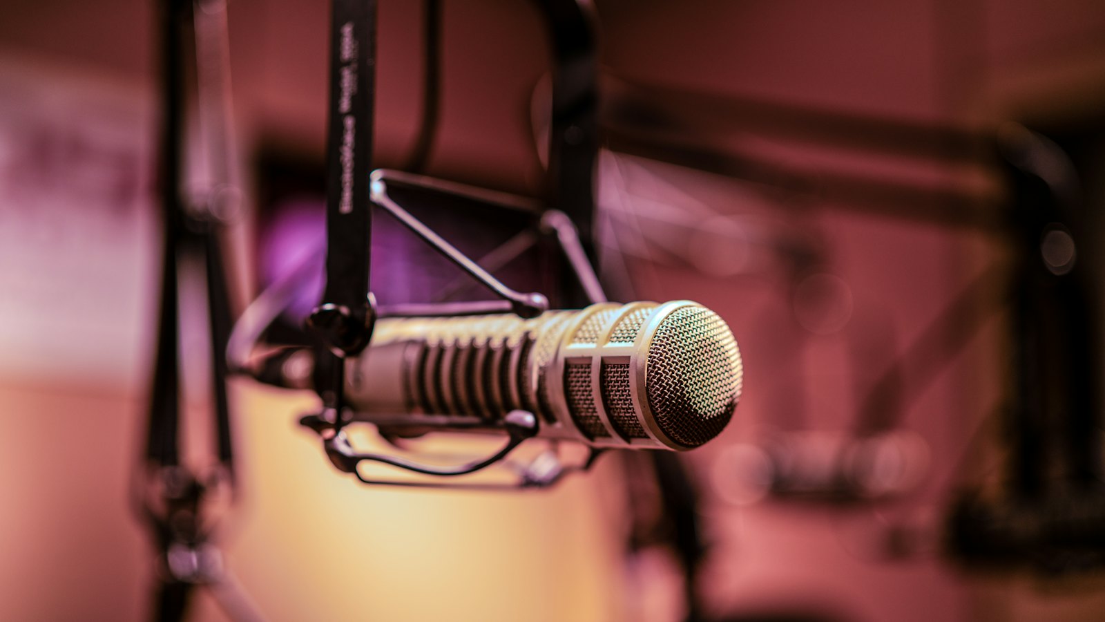 Broadcast microphone on a boom arm in a recording studio